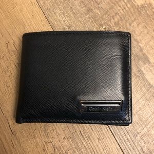 Calvin Klein black full grain leather wallet.